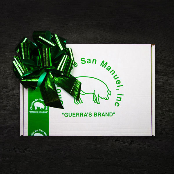 Buy steaks displayed in a white holiday box with green ribbon