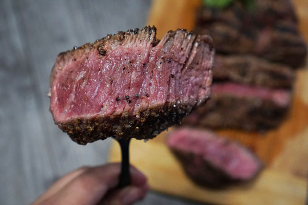 For a rare steak, cook for six to 10 minutes so the center is bright red.