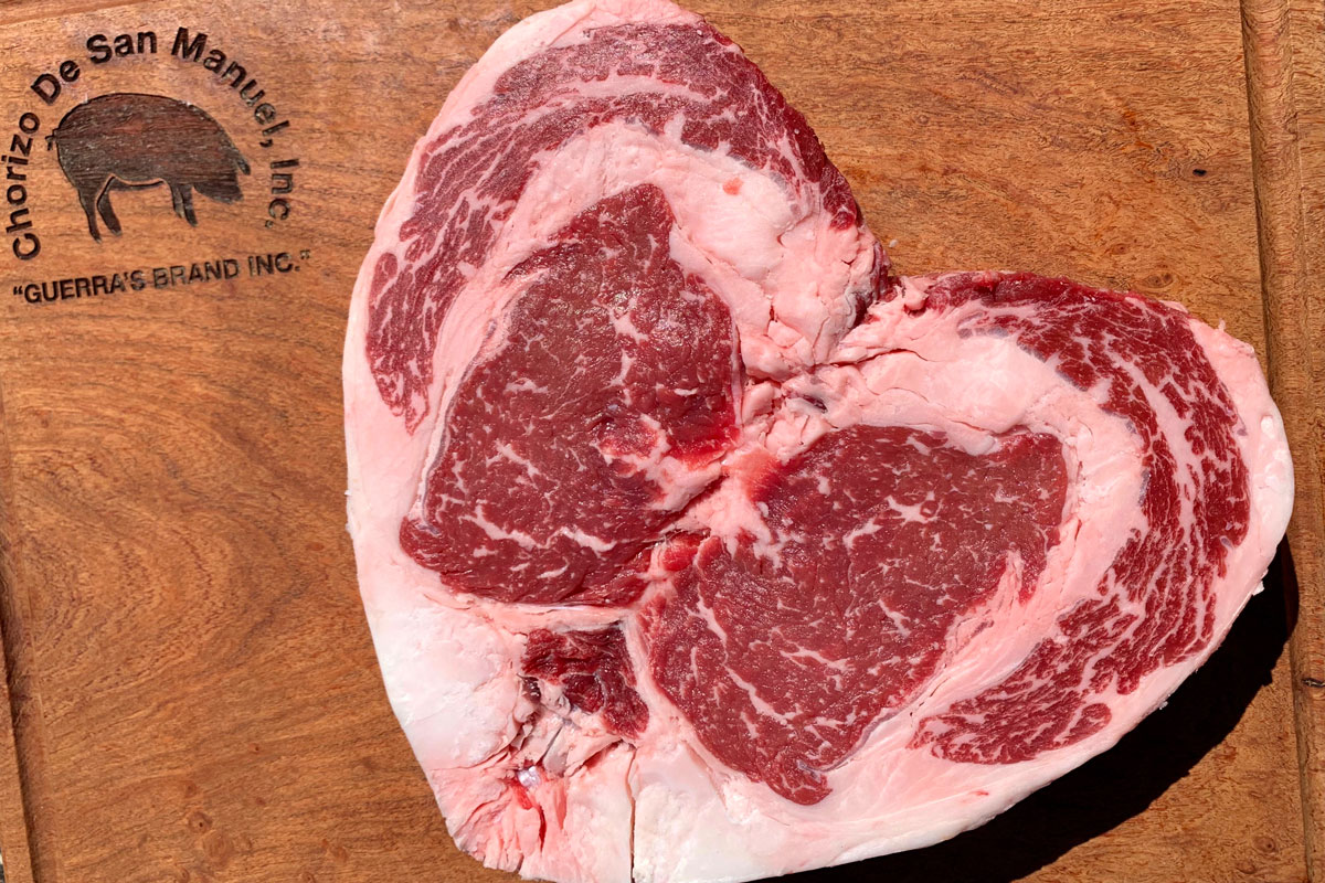 Cupid Ribeye | Choice or Prime Cut Ribeye 1 Cupid Ribeye on Chorizo de San Manuel cutting board