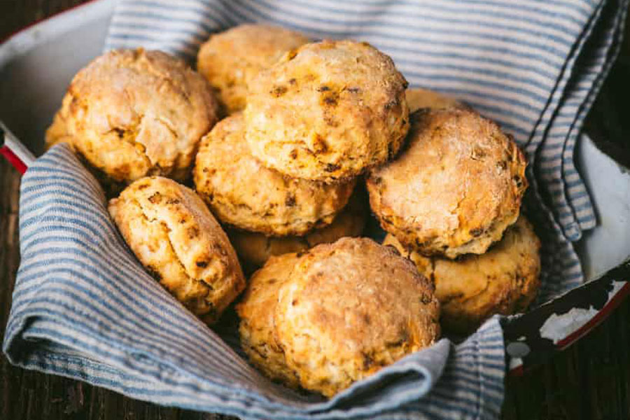 Try this Mexican Chorizo Biscuits Recipe with Chef Melissa Guerra 1 Mexican chorizo fresh on a wooden skillet from Chorizo De San Manuel.